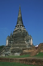 People, chedi at Wat Phra Si Sanphet, Ayutthaya, Thailand, December 2002, vintage, retro, old,