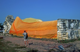 Tourist, statue of reclining Buddha, Ayutthaya, Thailand, December 2002, vintage, retro, old,