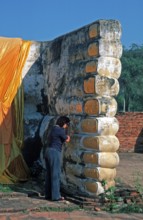 Woman praying, statue of reclining Buddha, feet, Ayutthaya, Thailand, December 2002, vintage,