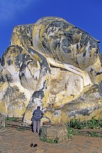 Believer, statue of the reclining Buddha, Ayutthaya, Thailand, December 2002, vintage, retro, old,