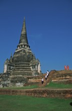 People, monks, girls, chedi at Wat Phra Si Sanphet, Ayutthaya, Thailand, December 2002, vintage,