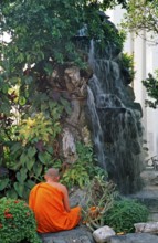Meditating monk, waterfall, Wat Pho, Bangkok, Thailand, December 2002, vintage, retro, old,
