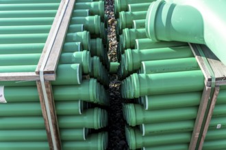 Symbolic picture construction site, sewage pipes for dirty and rainwater, for installation in the