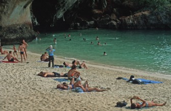People bathing and sunbathing on Pranang Cave beach, two years in front of the tsunami, Krabi,