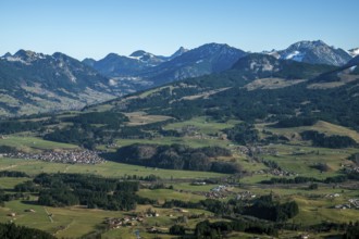 View from the Bolsterlanger Horn of villages in the Illertal and mountains of the Allgäu Alps,
