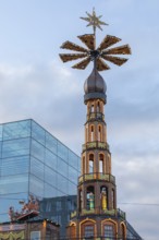 Stuttgart 2025 Christmas market on Schlossplatz with festive lights, a Christmas pyramid, mulled