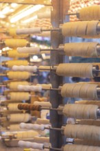 The trendy Chimney Cake stand at Stuttgart Christmas Market offers freshly baked, sweet treats. The