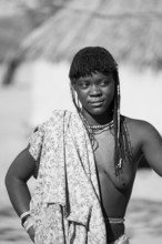 Black and white, portrait, brightly decorated woman of the Hakaona tribe, also Havakona or