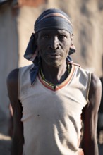 Portrait, man of the Hakaona tribe, also Havakona or Hakawona, near Opuwo, Kunene, Namibia