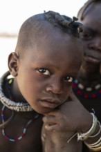 Portrait, Himba child, traditional Himba village, Kaokoveld, Kunene, Namibia