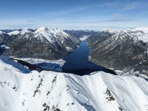 Aerial view, epic view of mountain landscape with snow in winter, summit of Bärenkopf, Achensee,