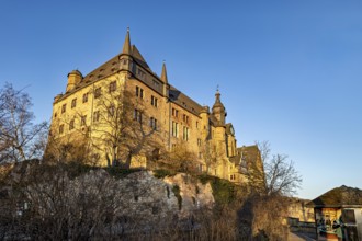 Majestic castle in Marburg in the warm light of the evening sun and a clear sky, The Landgrave