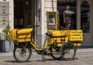 Deutsche Post bicycle loaded with luggage, letter and parcel delivery, Potsdam, Brandenburg,