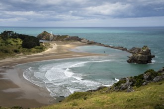 Deliverance Cove and Castlepoint Lighthouse, Castle Rock views, rocks, ocean. Castlepoint,
