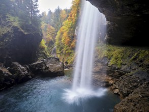 Waterfall mountain list in autumn-colored surroundings, Linthal, Klausenpass, Canton of Glarus,
