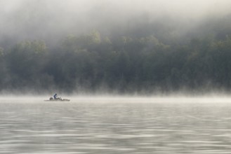 Hennesee, fog, rising clouds of fog, anglers in the boat, Hennetalsperre, Sauerland-Rothaargebirge