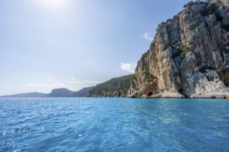 Picturesque rocky coast, cliffs and blue sea, Golfo di Orosei, Baunei, Sardinia, Italy