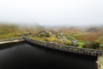 Autumn over Claerwen Dam, Claerwen Valley, Elan Valley Reservoir, Rhayader, Powys, Wales, UK