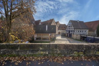 Historic city wall built in the 14th century, old town houses behind, Lauf an der Pegnitz, Middle