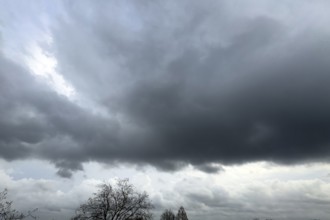 Large grey cloud roller Stratocumulus cluster layer cloud during high winter conditions,