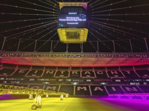 The Frankfurt Waldstadion (Deutsche Bank Park) is illuminated in red to mark the founding of the