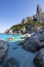 Light blue clear sea on a dream beach on Cala Goloritzé, picturesque rocky coast, steep coast with