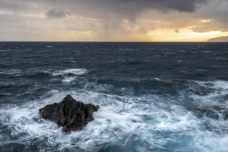 Sunrise, waves and rocks, coast near Porto Moniz, Madeira, Portugal