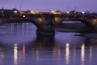 Augustus Bridge Dresden with a tram, Elbe with reflection, winter, Saxony, Germany