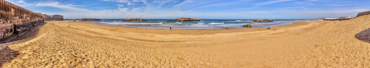 Extensive sandy beach with calm sea and clear sky, Morocco, Essaouira, coast, panorama