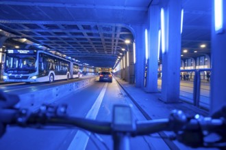 Cycling in the city, in the dark, in the evening, cycling underpass at the main train station, in