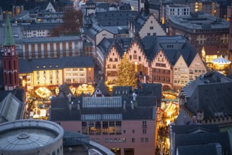 The lights of the Frankfurt Christmas market are shining on the Römerberg in downtown Frankfurt am