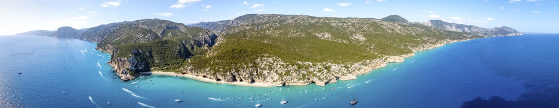 Panorama, picturesque rocky coast, cliffs and Cala Luna beach, aerial view, Golfo di Orosei,