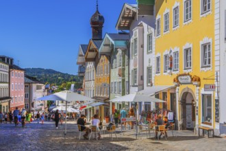 Historic market street with street cafe and typical gabled houses, Bad Tölz. Isartal, Upper