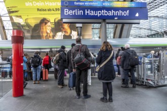 Central Station in Berlin, passengers on the platform, train arrives, Germany