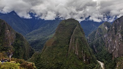 Impressive mountain landscape under dramatic clouds, The Urubamba Valley near Machu Picchu in Peru