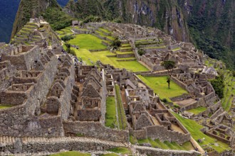Rocky ruins and expansive terraces in an ancient setting, the ruins of the Inca city of Machu
