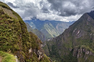 Hilly mountain landscape under cloudy sky, The Urubamba Valley near Machu Picchu in Peru