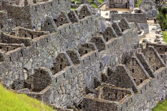 Detailed stone structures and walls in a historic site landscape, the ruins of the Inca city of