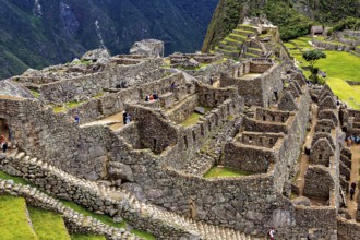 Stone Inca ruins of Machu Picchu surrounded by mountainous landscape, The ruins of the Inca city of