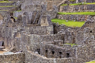 Detailed Inca stone structures and green terraces near Machu Picchu, The ruins of the Inca city of