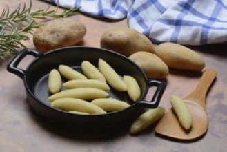 Raw Schupfnudeln in pan, type of pasta, Germany