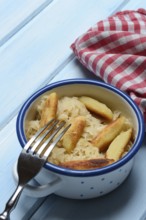 Fried puff noodles with sauerkraut in pots