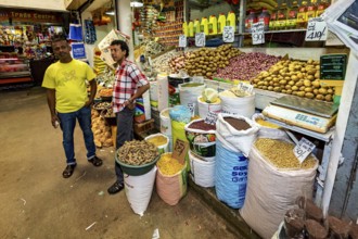 Retailers offer a variety of spices and foodstuffs, retailers in the market halls of Kandy Sri