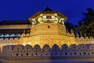Impressive night lighting of a historic building with traditional elements, The Temple of the Tooth