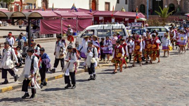 Large group of people wearing traditional costumes at a parade, traditional parade of festival
