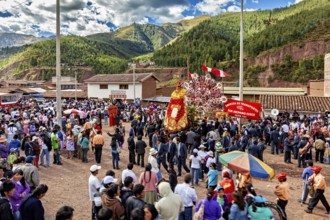 Large gathering of people at an open-air festival, traditional parade of festival groups in Cusco