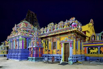 Hindu temple at night, illuminated, with intense colors and detailed architecture, The Sri