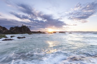Sunset at Fisherman's Lookout. Dramatic waves and coastal scenery at The Pass, New South Wales,