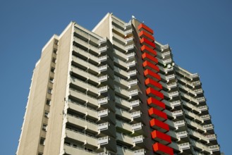 High-rise apartment building with balconies and satellite dishes, satellite town of Chorweiler in