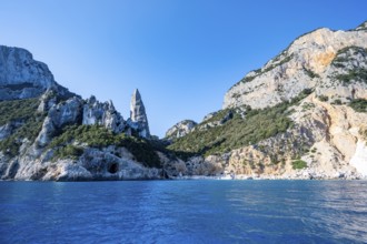 Picturesque rocky coast, cliffs with L'Aguglia pinnacle, blue sea and Cala Goloritzé beach, Golfo
